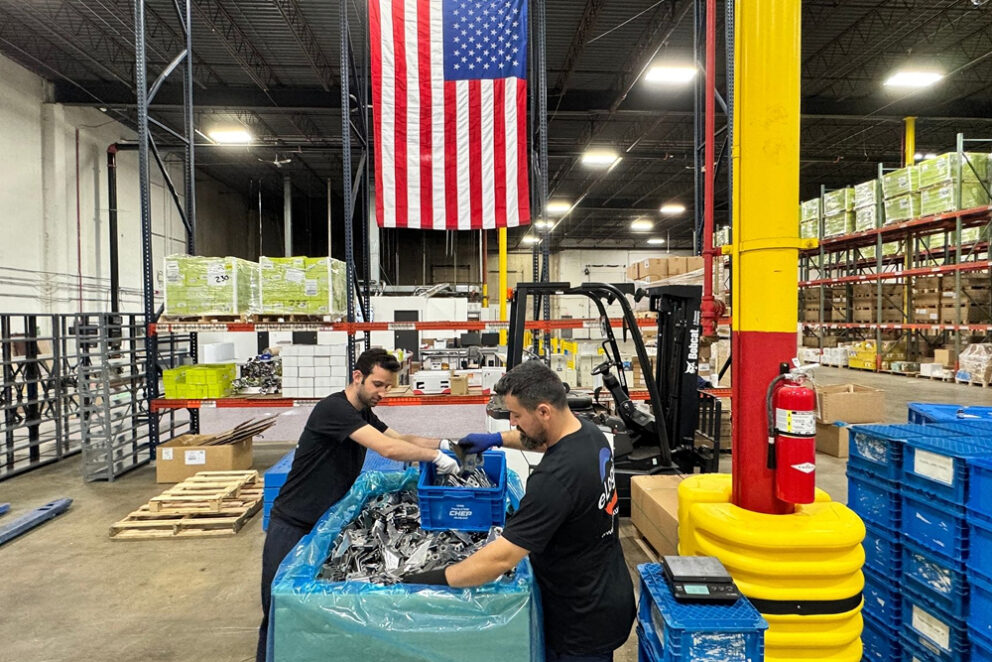eLogix Warehouse sorting container with coworker